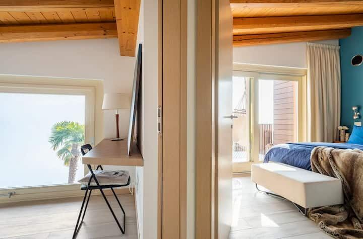 Spiglia luxury duplex apartment with modern interiors and scenic views.