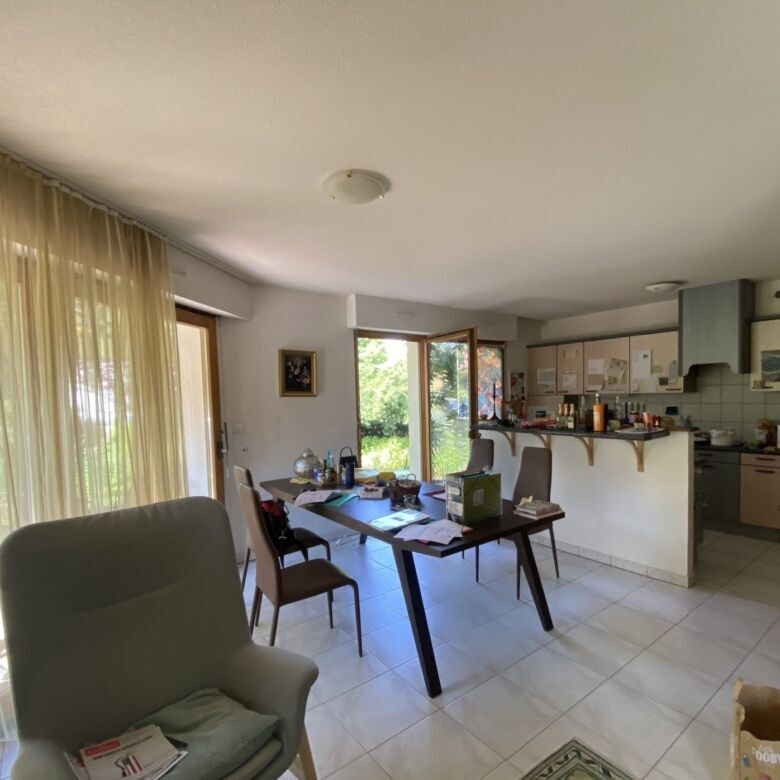 Spacious interior of a 3-bedroom house in Seppois-le-bas, featuring a bright living area and open ki.