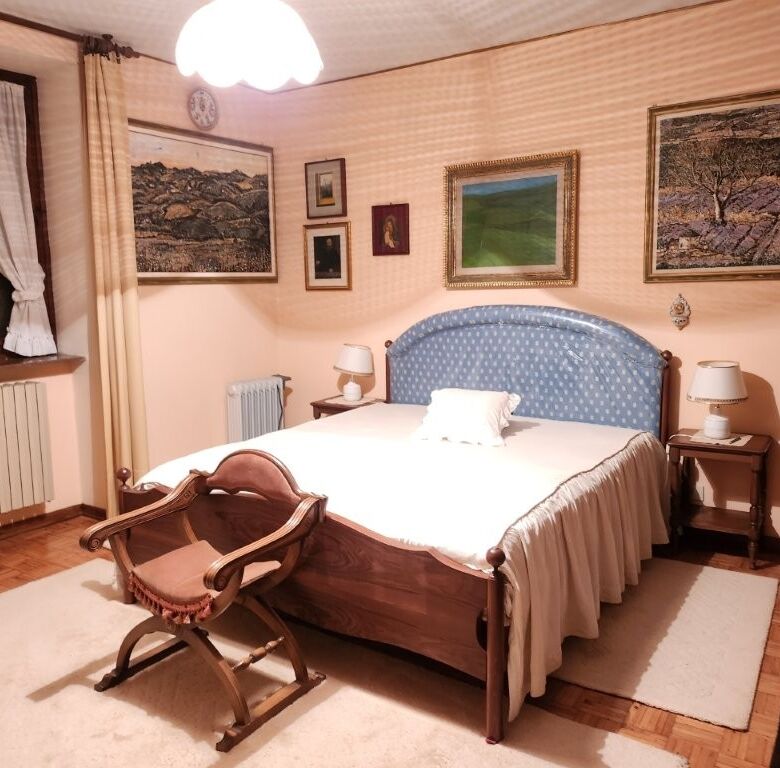 Elegant bedroom in a luxury country villa in Salsomaggiore Parma.