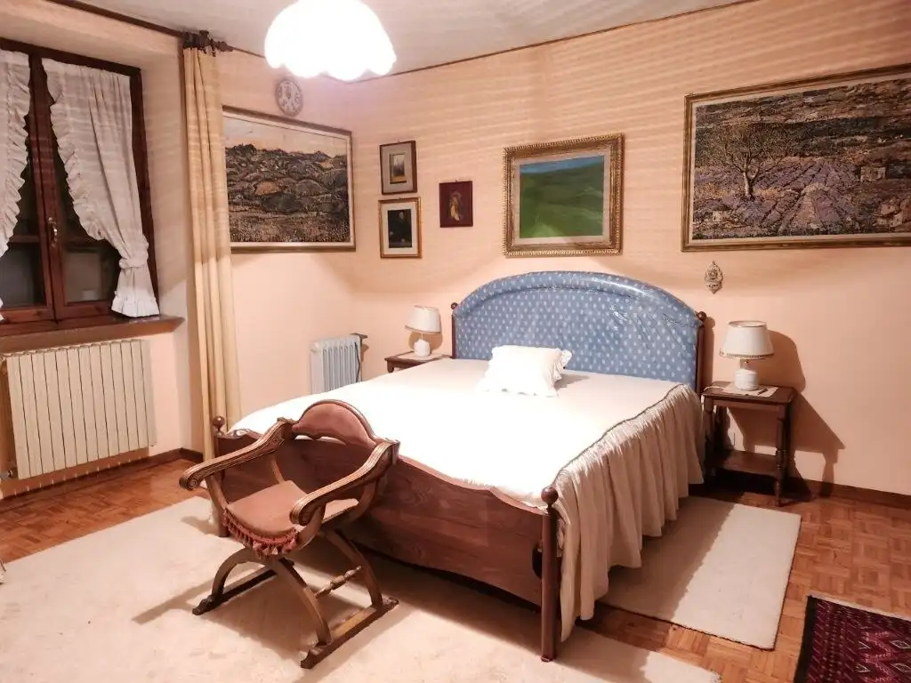 Elegant bedroom in a luxury country villa in Salsomaggiore Parma.
