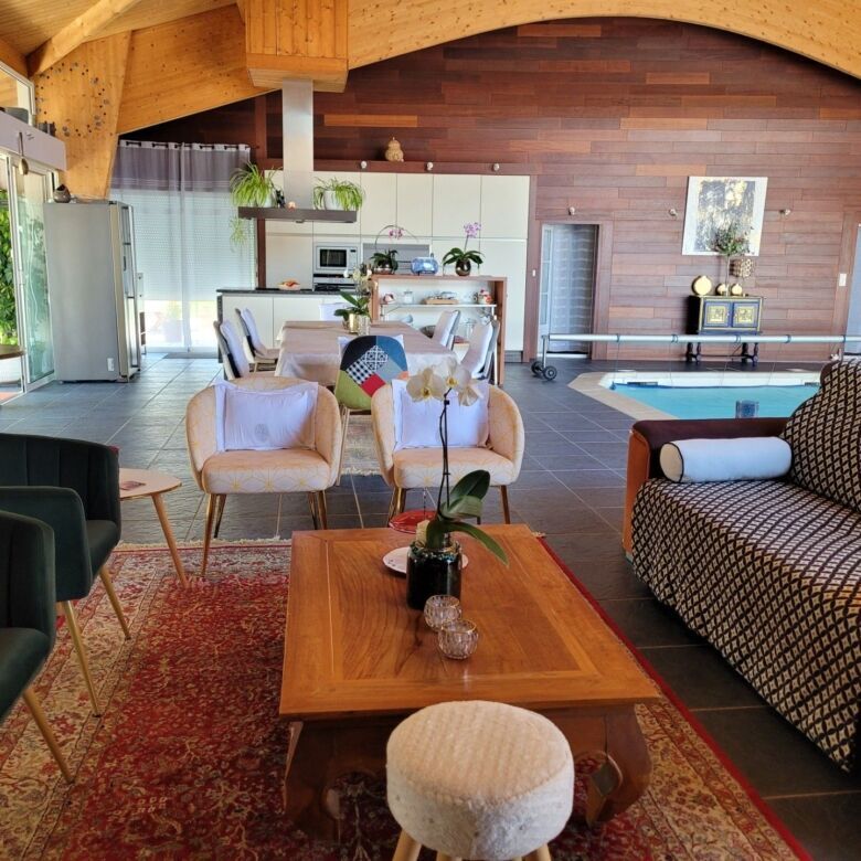 Bright, stylish interior with comfortable furniture and large windows.