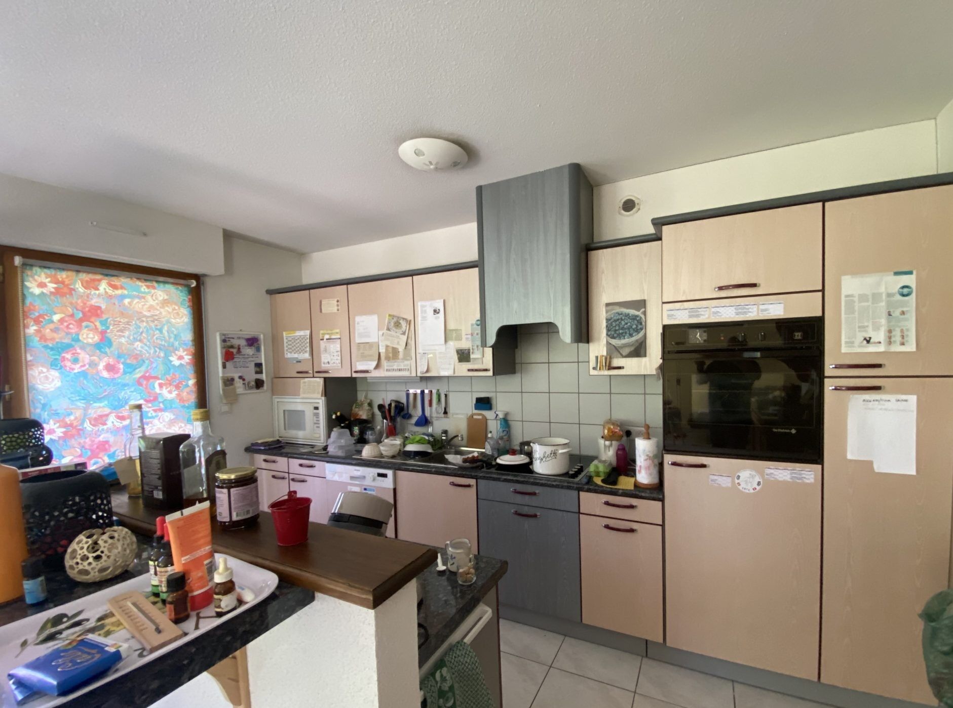 Interior view of a 3-bedroom house kitchen in Seppois-le-bas, with modern cabinets and appliances.