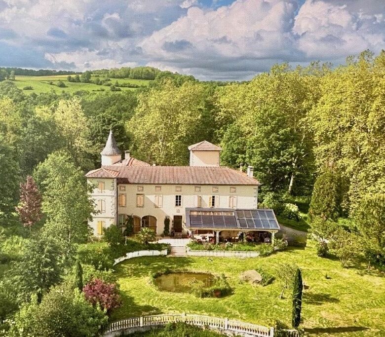 Chateau de Montcru with 12 bedrooms in Allières Ariège, surrounded by lush greenery and scenic lands.