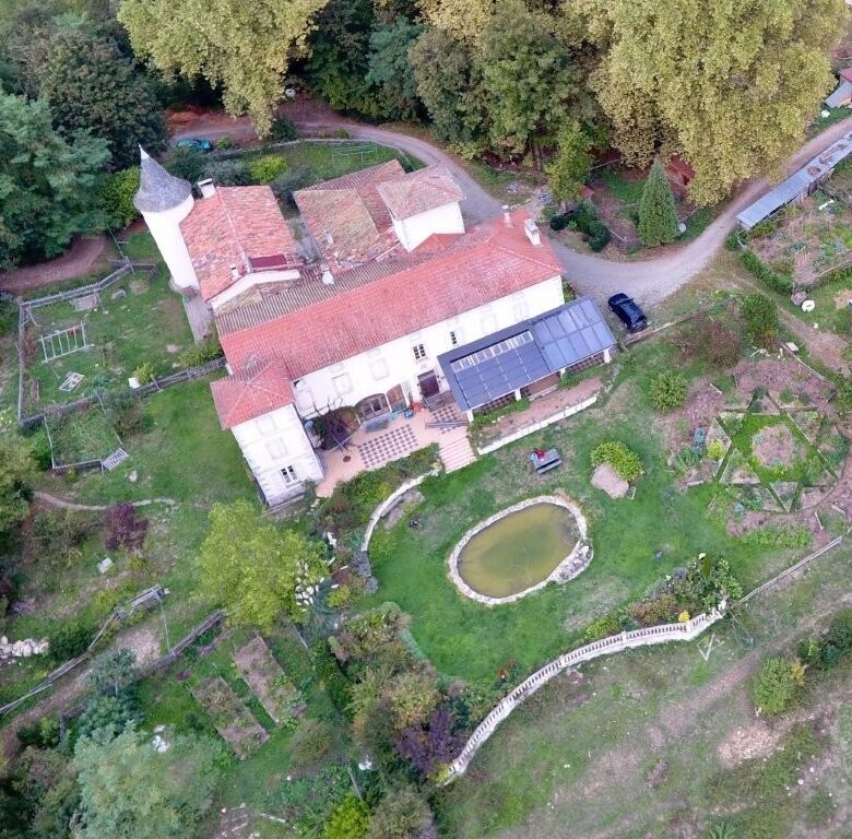 Elegant chateau with extensive gardens and pond in Allières Ariège, featuring 12 bedrooms and histor.