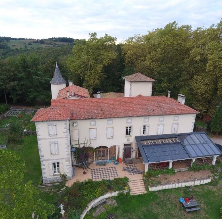 Chateau de Montcru, a historic 12-bedroom property for sale in Allières, Ariège, surrounded by lush.
