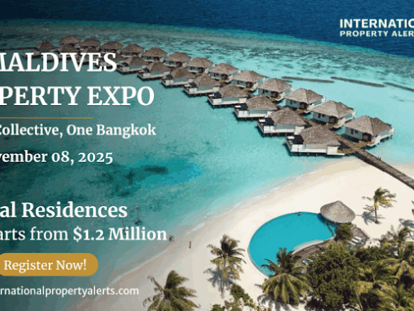 Overwater villas at Coral Residences Maldives with turquoise waters and lush surroundings.