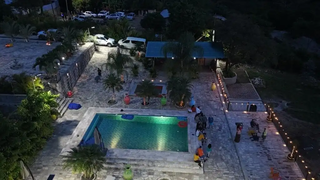 Luxury 5-bed resort-style villa with pool in La Trinidad, mountain setting.