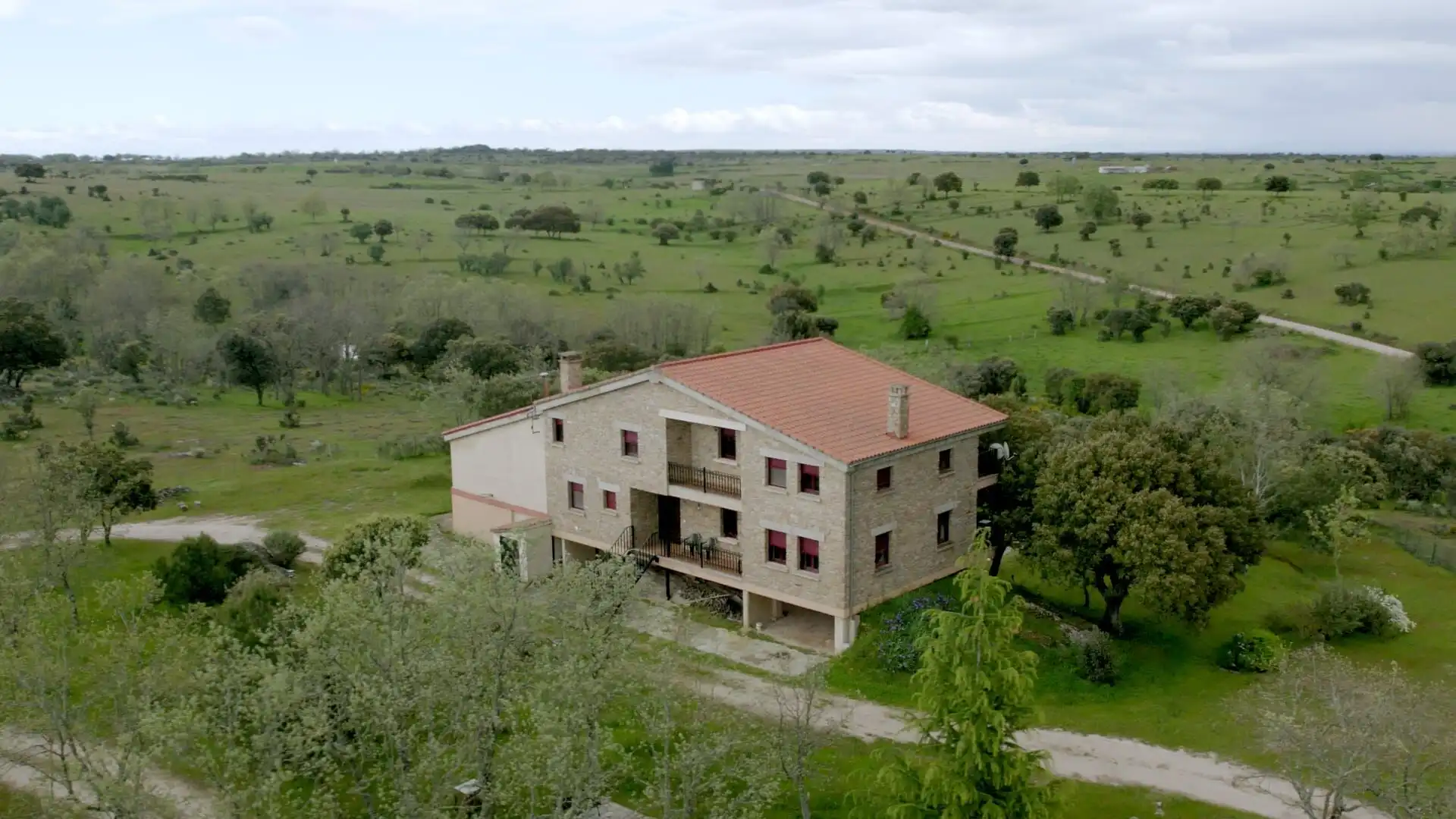 Traditional stone house surrounded by private woodland in Salamanca, ideal for countryside living.