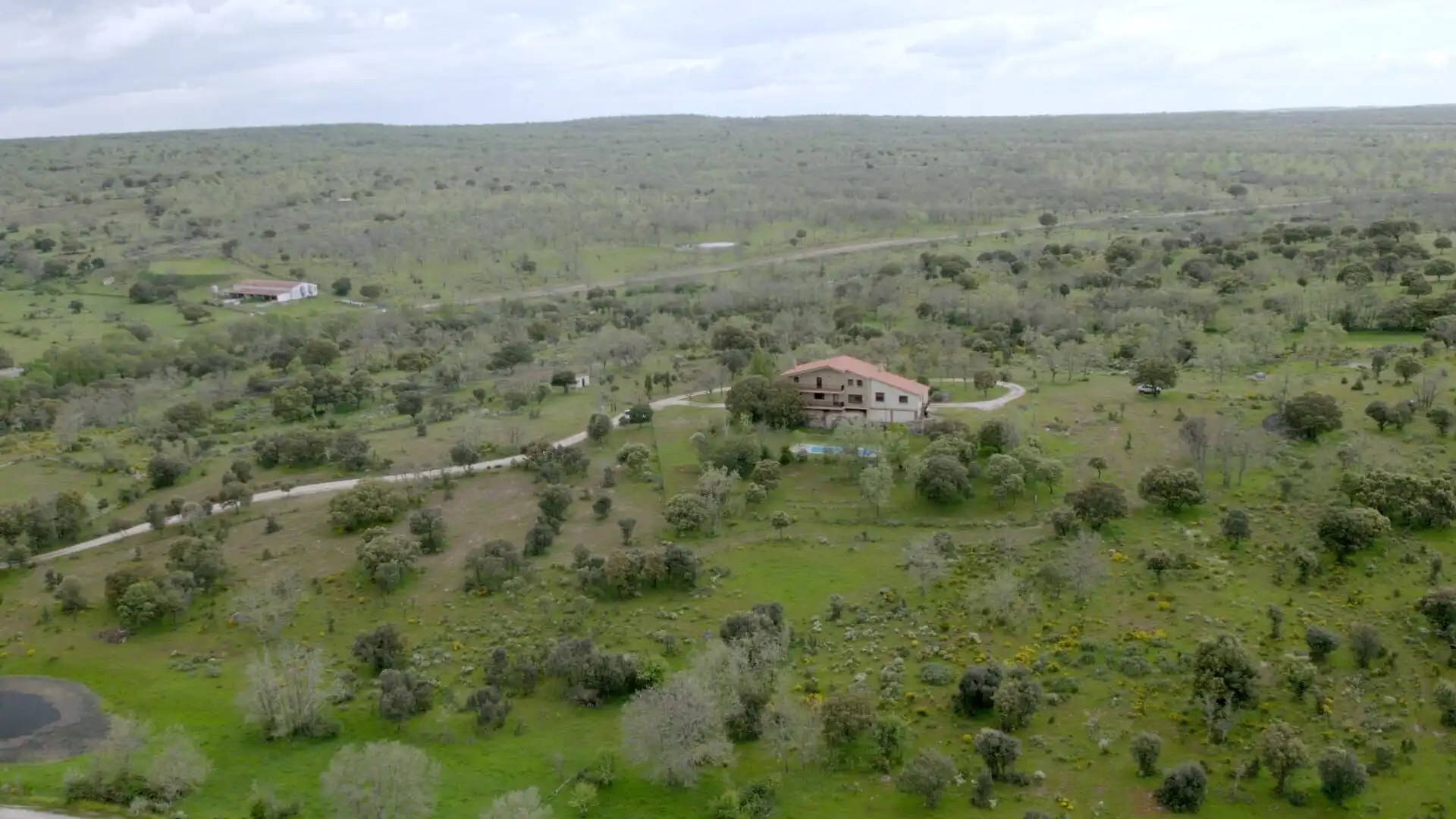 Rustic stone house surrounded by private woodland in Salamanca for sale.
