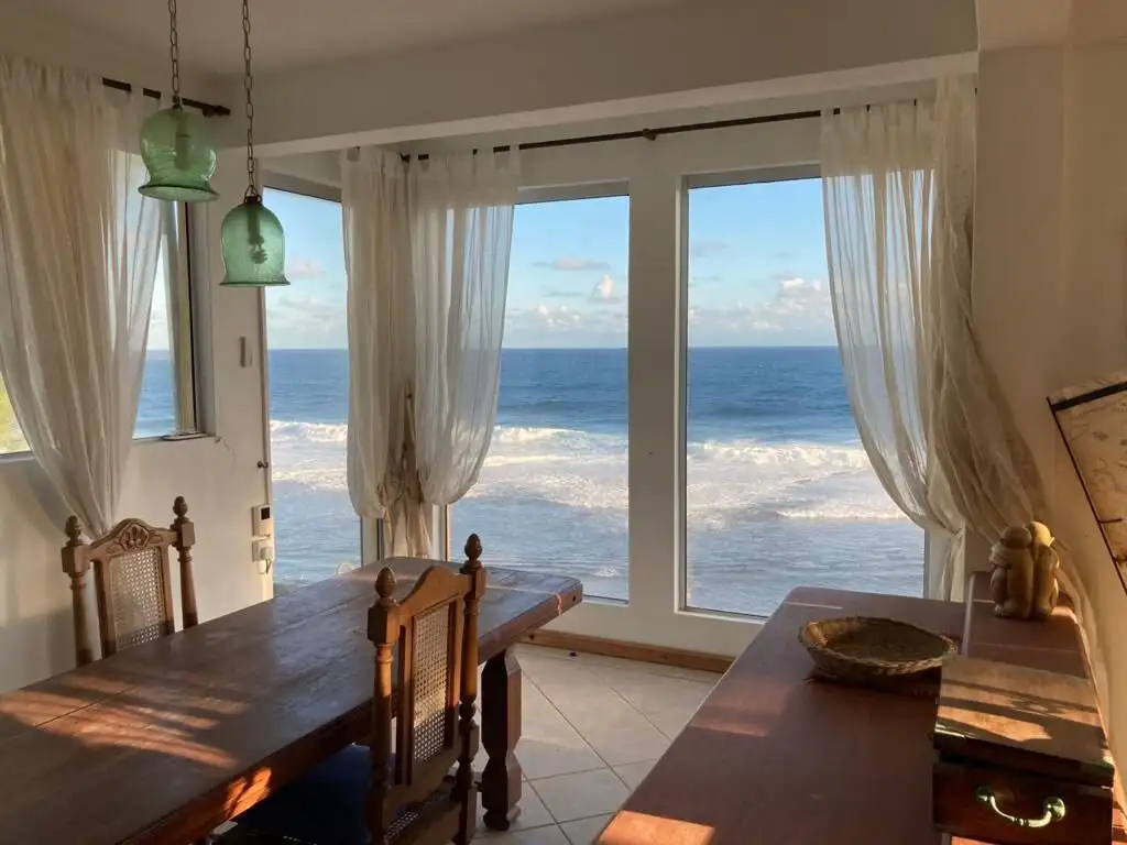 Seaside Luxury Living in Mauritius Seaside luxury living with ocean views in Mauritius, featuring a bright, airy interior and large win.