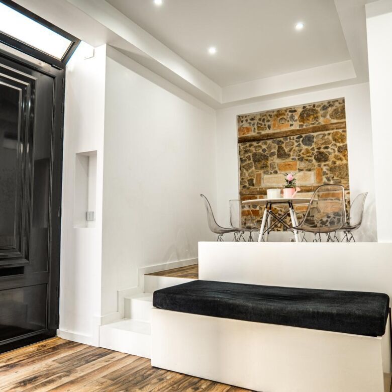 Elegant boutique hotel interior in Leiria, Portugal, showcasing modern design and cozy seating area.