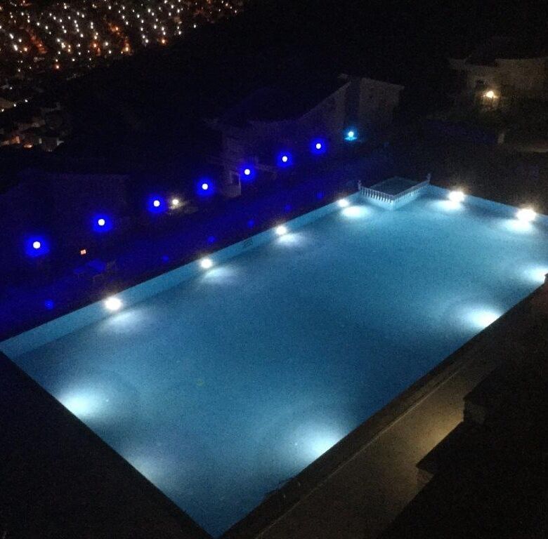 Bright night view of the private swimming pool at Pearl Rock Retreat, Akbuk Didim.