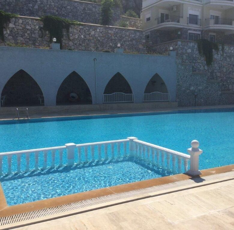 Pool with safety fence at Pearl Rock Retreat, Akbuk Didim.