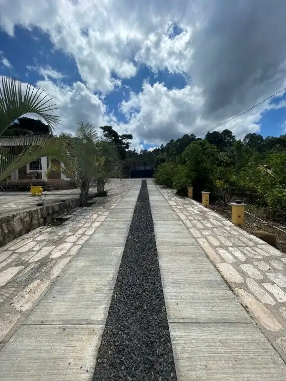 Pathway to Mountain Villa with Scenic Views.