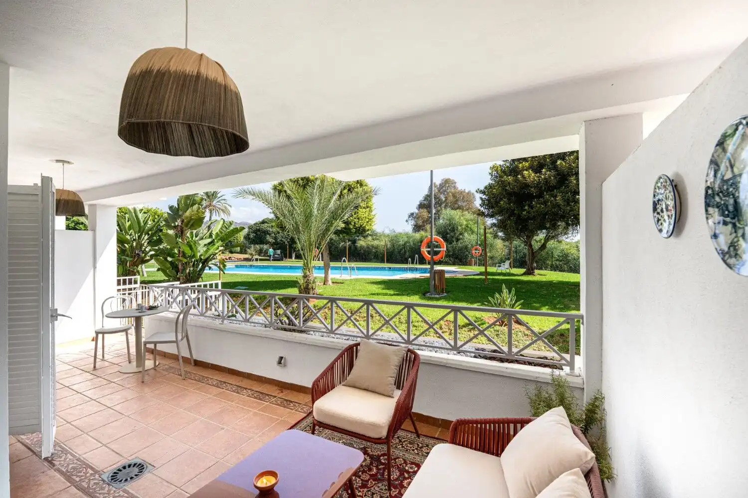 Marbella East beautifully renovated apartment with spacious terrace overlooking lush gardens and poo.