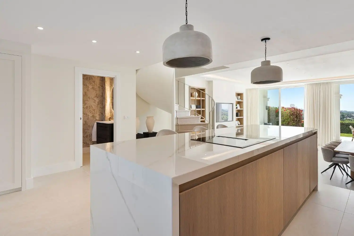 Bright and spacious kitchen in a fully renovated La Quinta townhouse in Benahavis. Modern design wit.