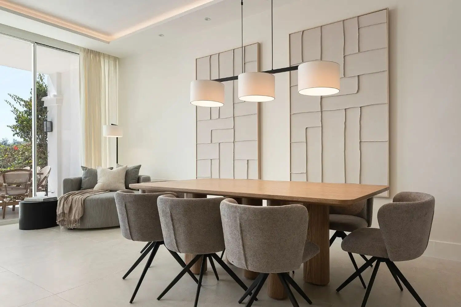 Elegant dining area with contemporary furniture and ambient lighting.