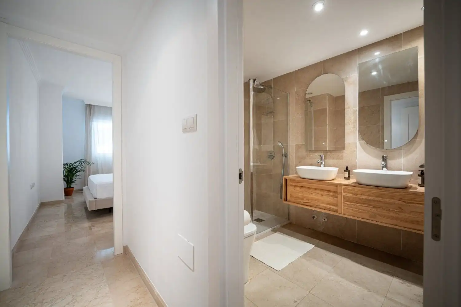 Bright Marbella East apartment with stylish bathroom and contemporary decor.