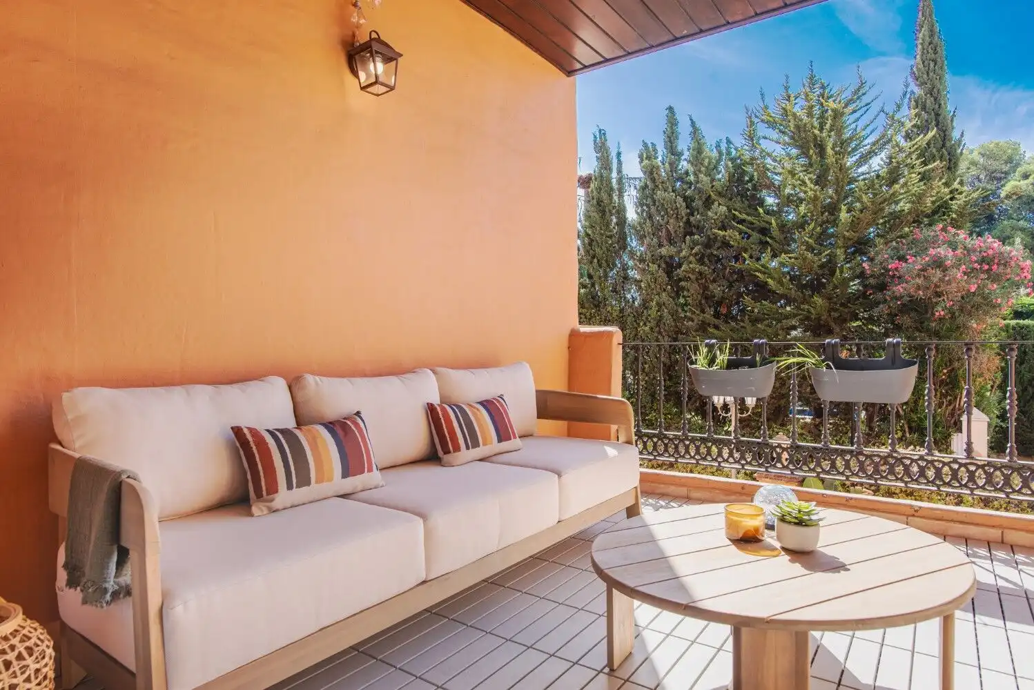 Bright terrace of a refurbished 2-bedroom apartment in New Golden Mile, Estepona.