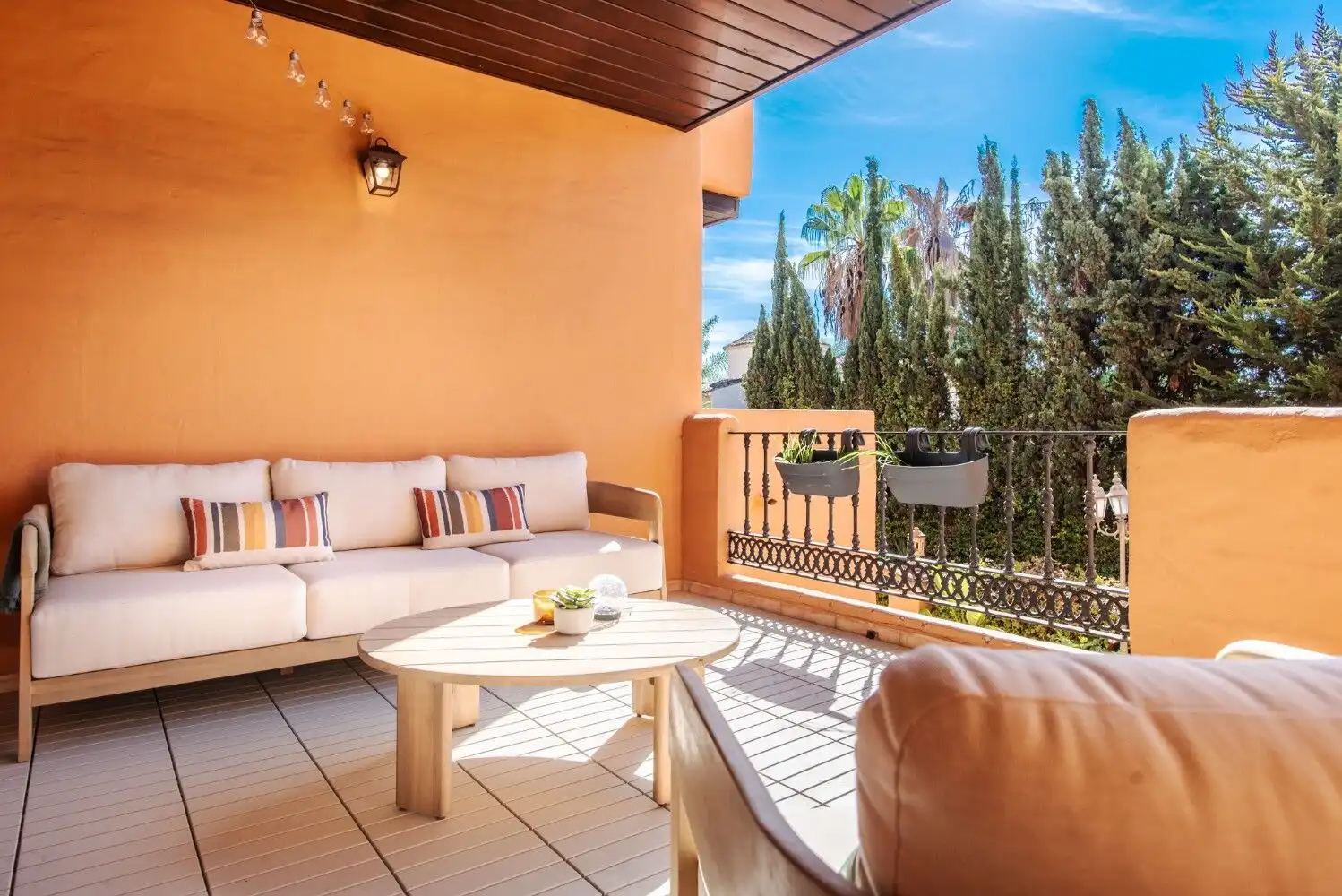 Spacious balcony of a fully refurbished 2-bedroom apartment in New Golden Mile, Estepona, with outdo.