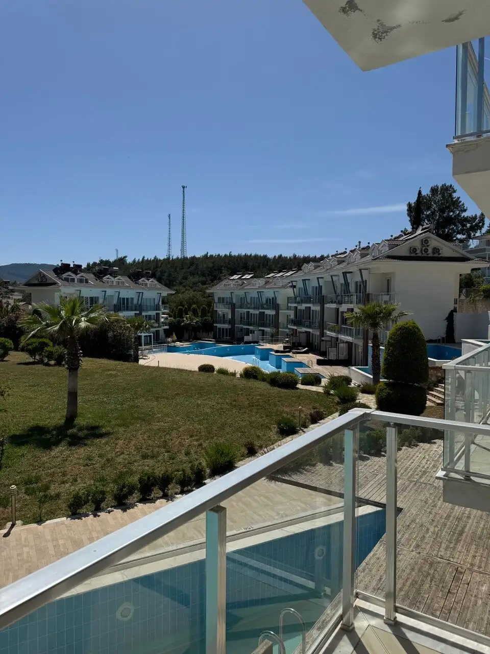 Luxury 2 bed apartment in Orka Residence, Ovacık, with stunning pool and mountain scenery.