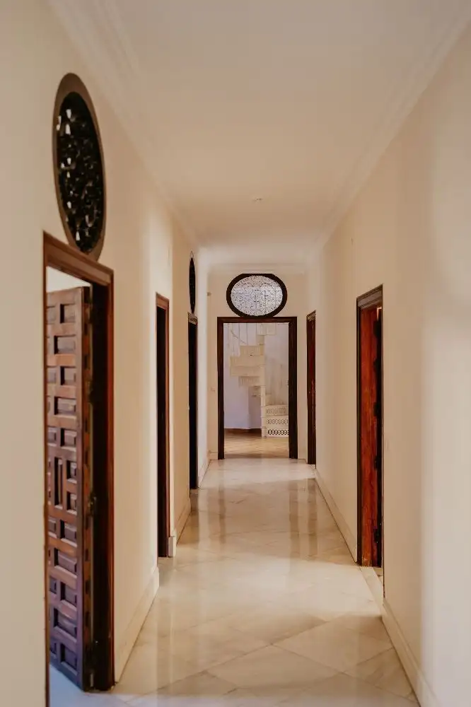Elegant Malaga penthouse hallway in historic city center.