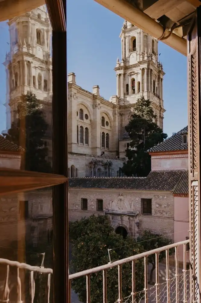 Penthouse apartment overlooking Malaga's historic cathedral in the city center.