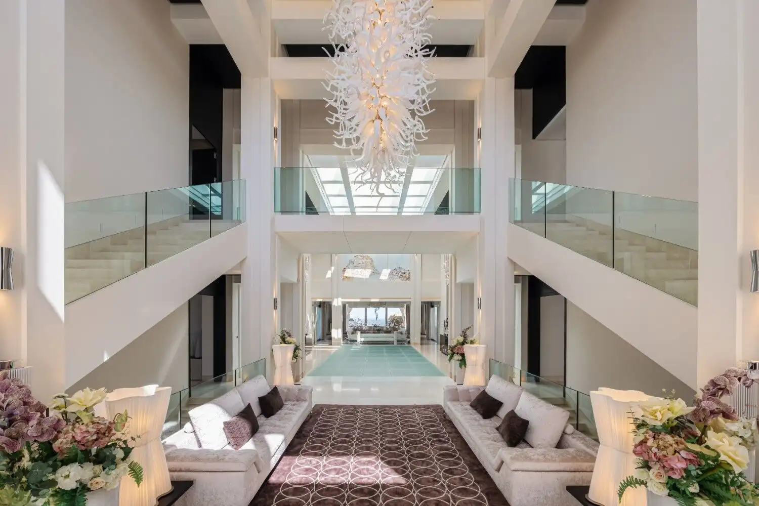 Elegant luxury mansion with spacious living area and modern decor.