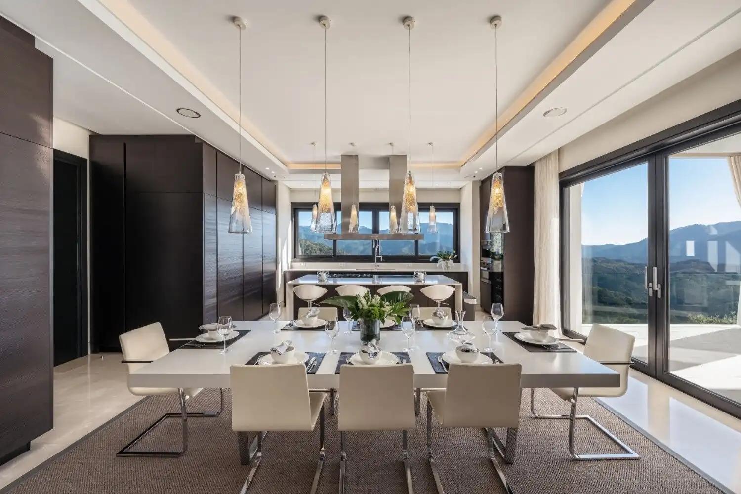 Elegant dining room with panoramic views in La Zagaleta mansion.