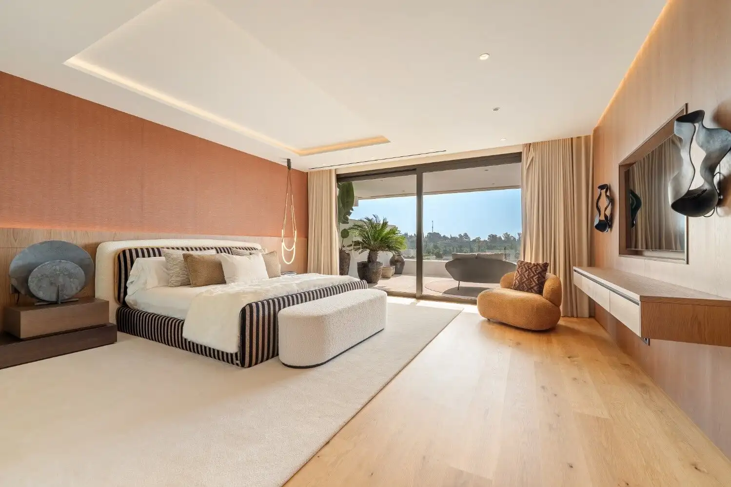 Elegant Marbella Golden Mile skyvilla with luxurious Fendi Casa furnishings and panoramic sea views.