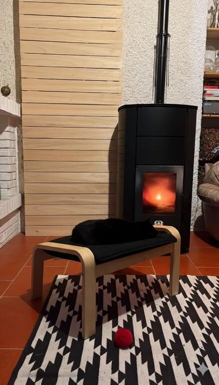 Indoor fireplace with a warm glow in a contemporary living space.