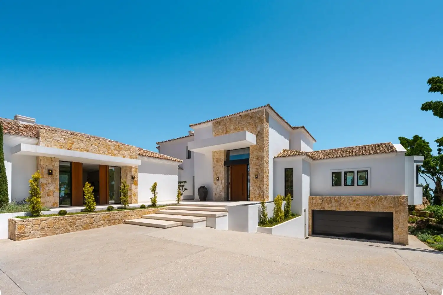 Luxury villa with panoramic mountain views and modern design. Perfect for exclusive living in a sere.