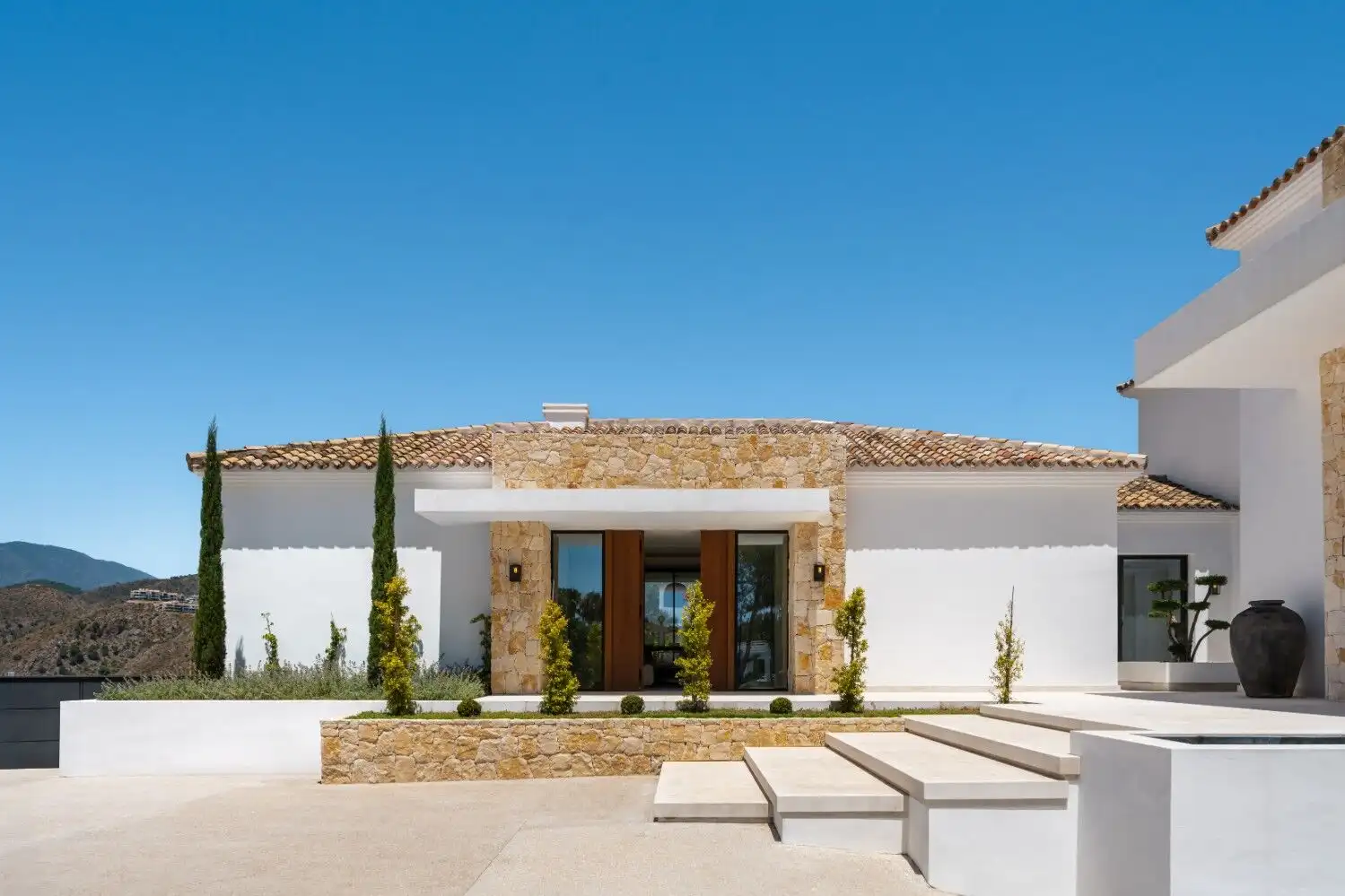 Elegant luxury villa with stunning mountain scenery and modern design. Perfect for exclusive living.
