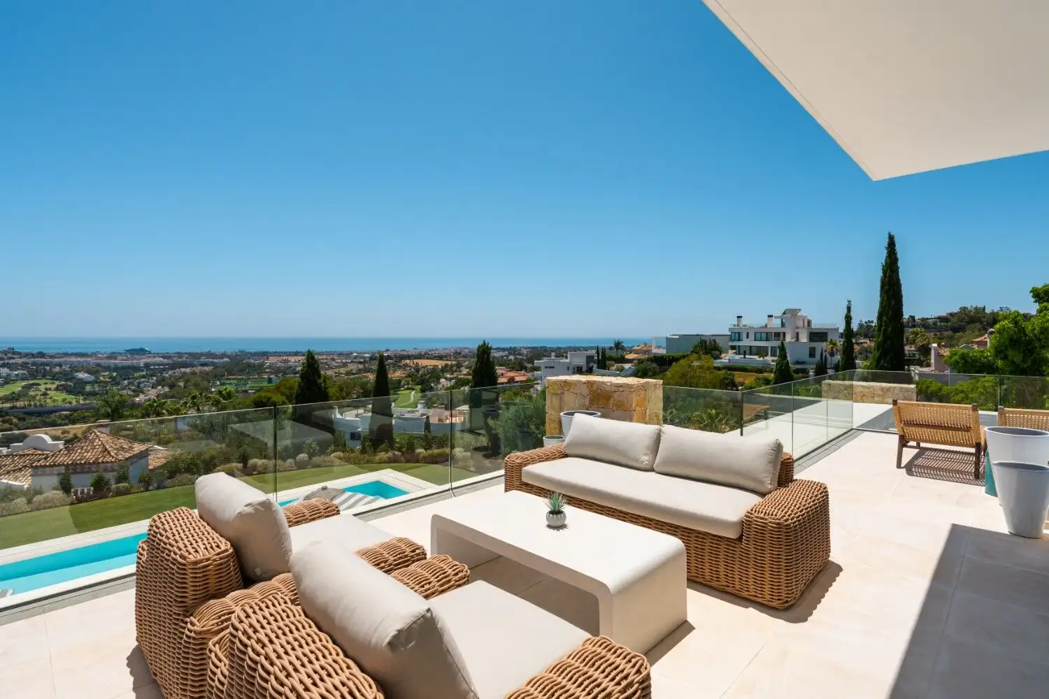 Luxury villa with panoramic ocean and mountain vistas in El Herrojo. Perfect for exclusive living an.