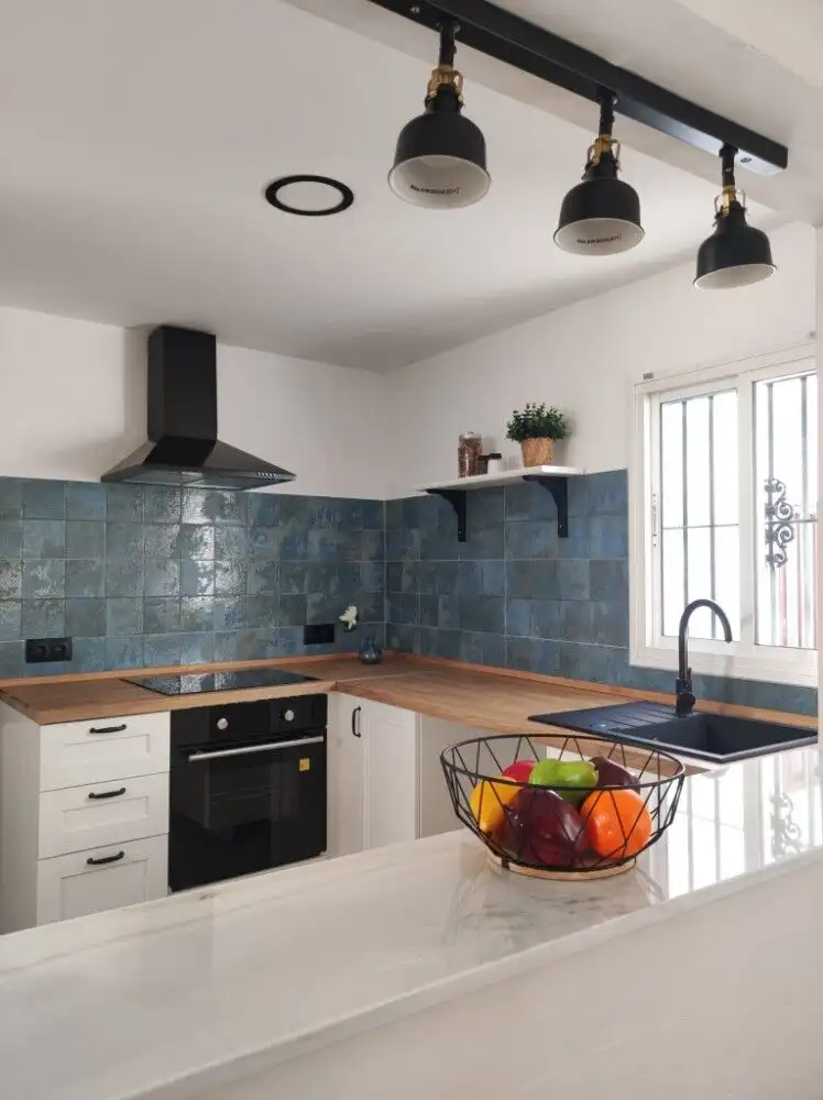 Cozy kitchen in Torresoto with modern appliances and stylish decor. Bright space with natural light.