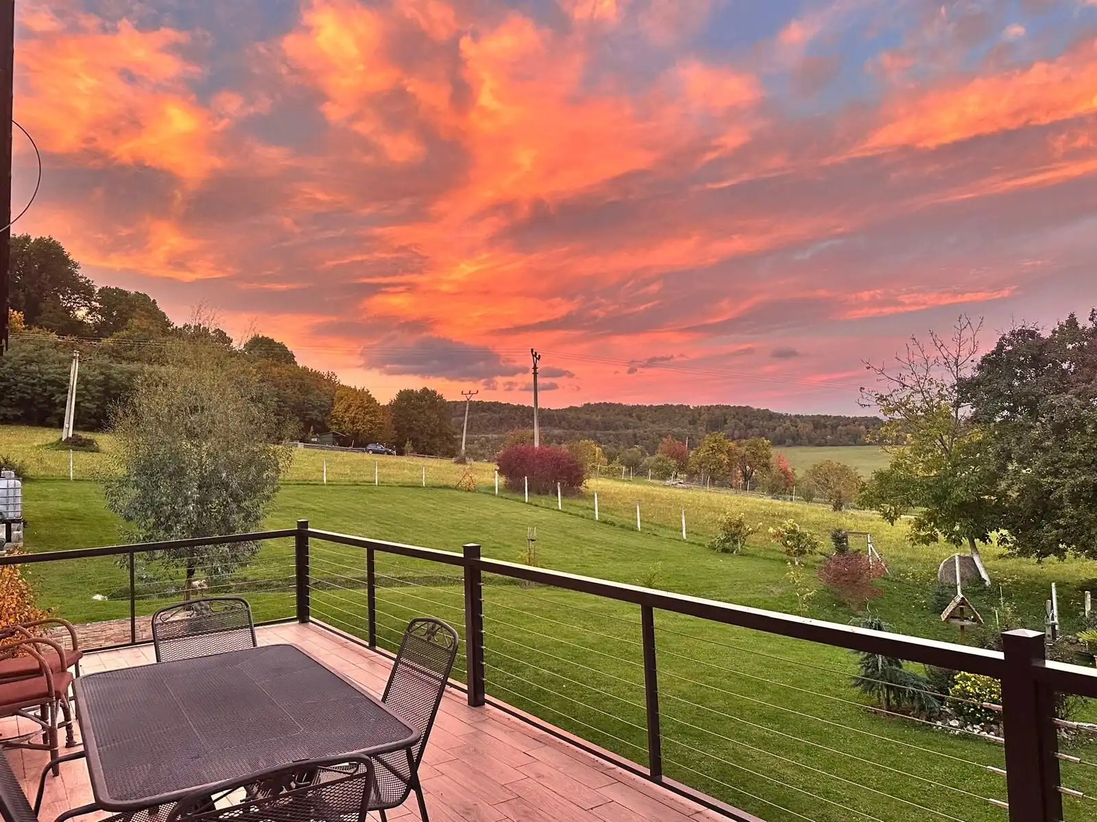 Beautiful sunset over a peaceful rural property in Lukovištia, Rimavská Sobota. Perfect for serene l.