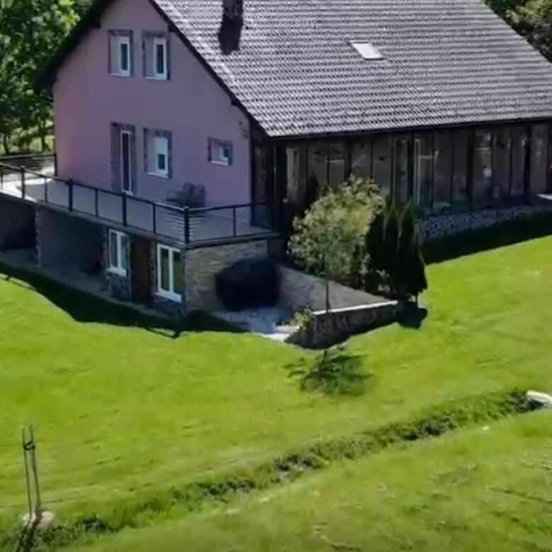 Spacious country house with four bedrooms, modern amenities, and scenic surroundings in Rimavská Sob.