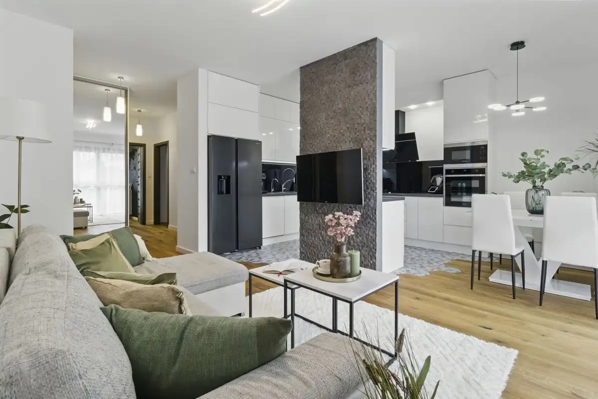Bright 2-bedroom apartment for sale in Warsaw with contemporary design and open-plan living space.