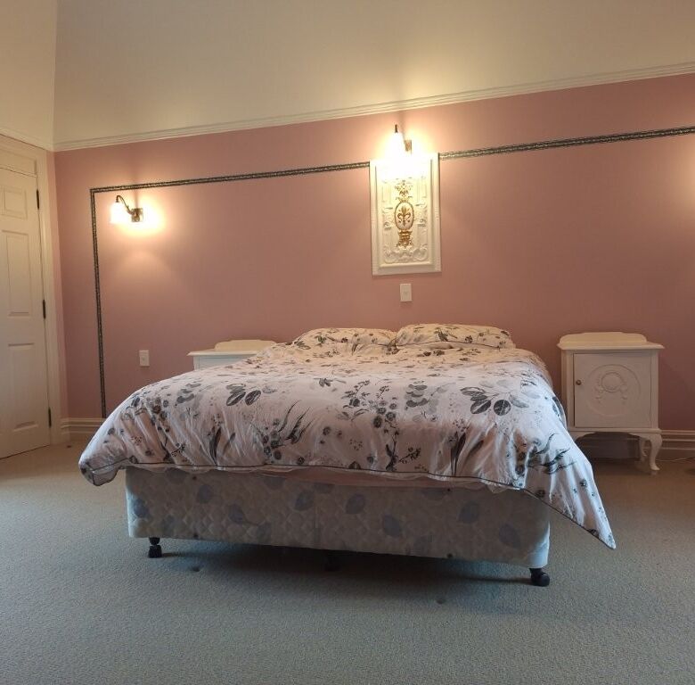 Elegant bedroom in Château Te Kamo, Ngararatunua, New Zealand.