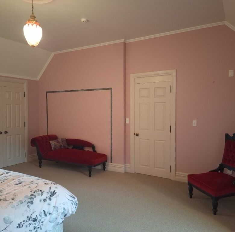 Interior of Château Te Kamo in Ngararatunua, showcasing elegant furnishings and spacious design.