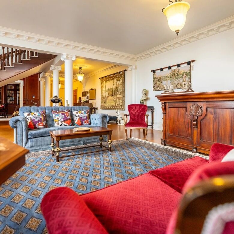 Elegant living room in a luxury château for sale in Ngararatunua, New Zealand.