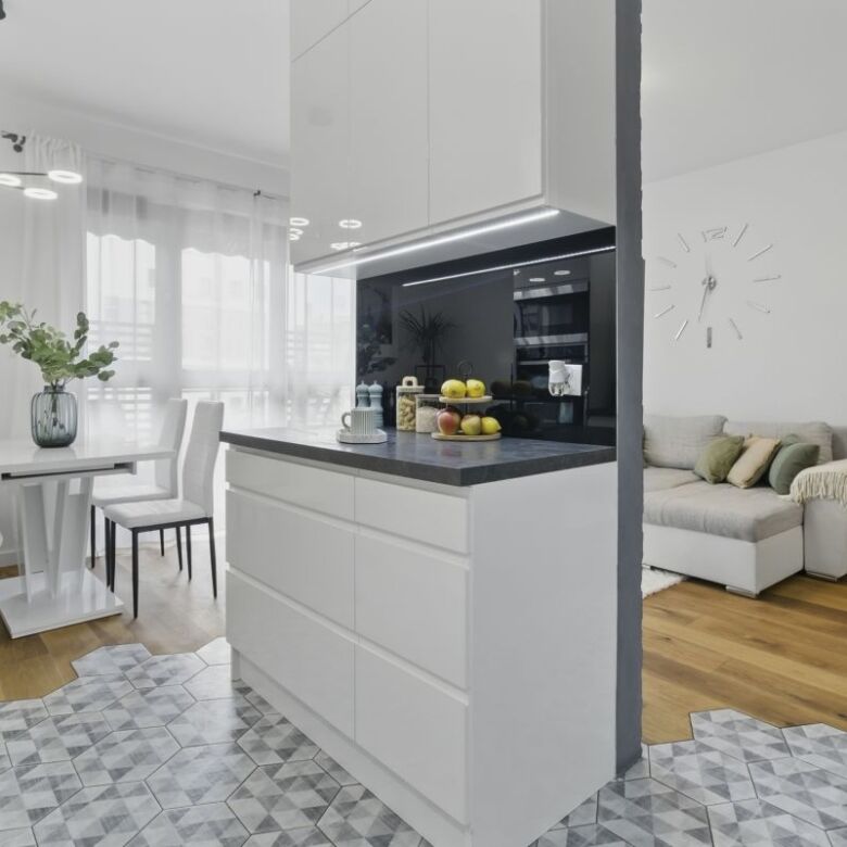 Bright and modern 2-bedroom apartment in Warsaw with stylish living and dining areas.