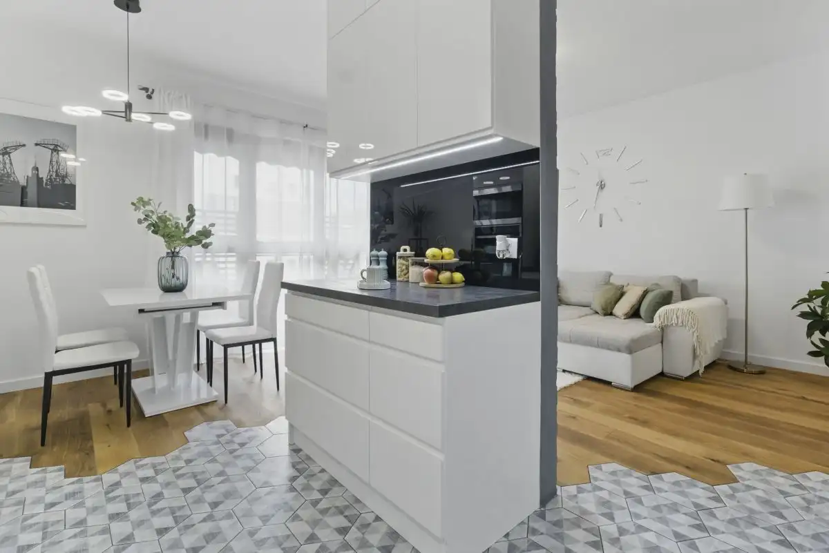 Bright and modern 2-bedroom apartment in Warsaw with stylish living and dining areas.
