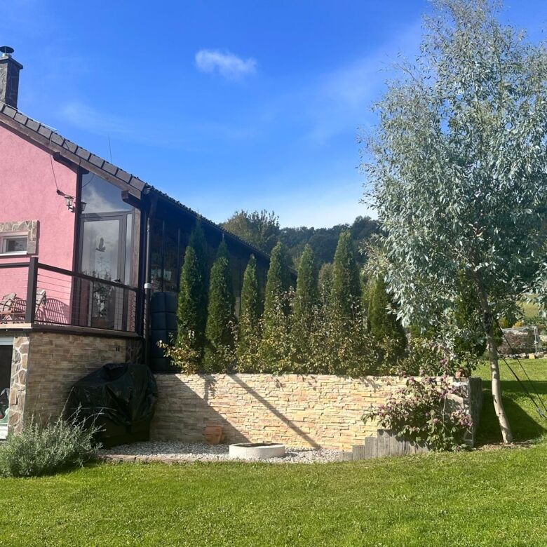 Beautiful country home with four bedrooms in Lukovištia, Rimavská Sobota, featuring a lush garden an.