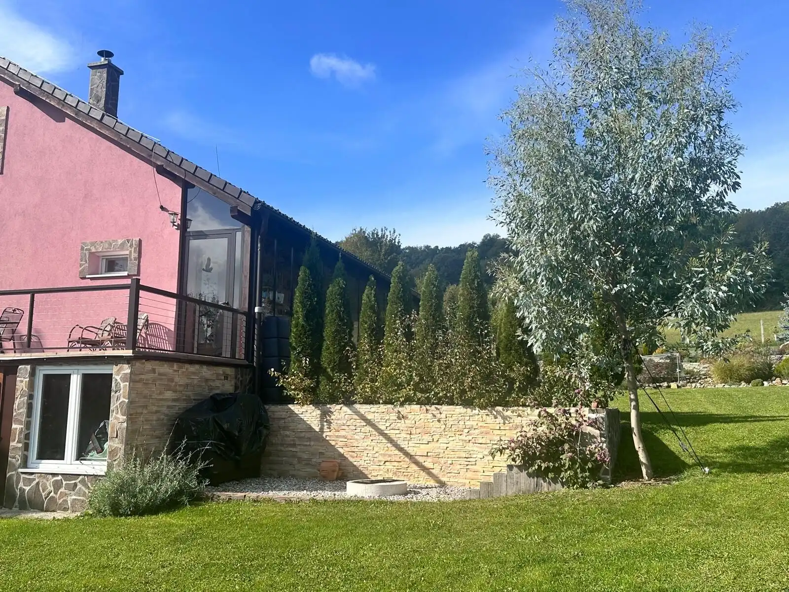 Beautiful country home with four bedrooms in Lukovištia, Rimavská Sobota, featuring a lush garden an.