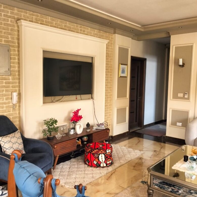 Modern living room with stylish decor and comfortable seating.