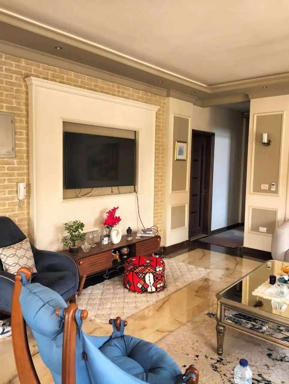 Modern living room with stylish decor and comfortable seating.