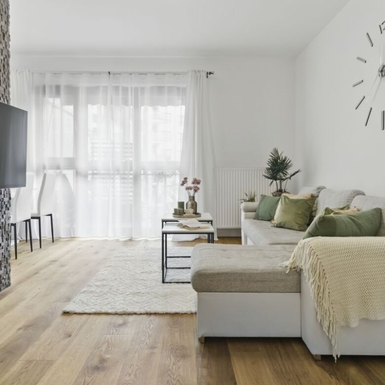 Bright and modern 2-bedroom apartment in Warsaw with stylish decor and spacious living area.