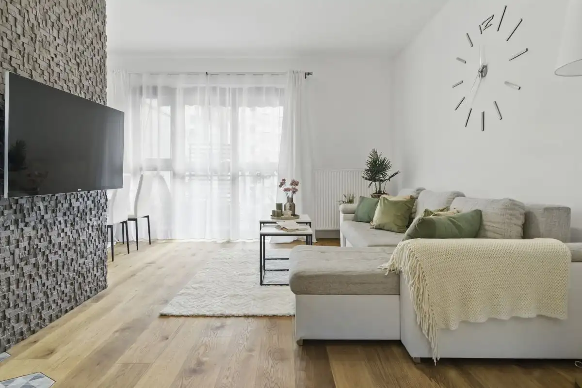 Bright and modern 2-bedroom apartment in Warsaw with stylish decor and spacious living area.
