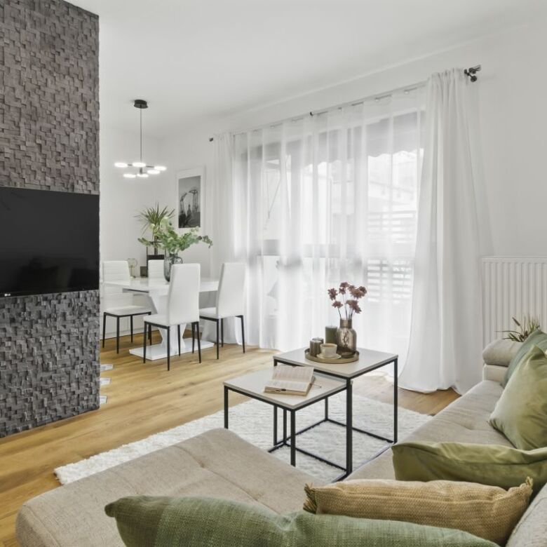 Bright and airy 2-bedroom apartment in Warsaw with stylish decor and spacious layout.